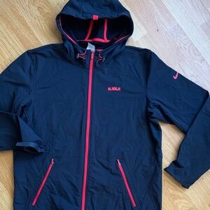 Nike Men's Black Windbreaker with Red Details